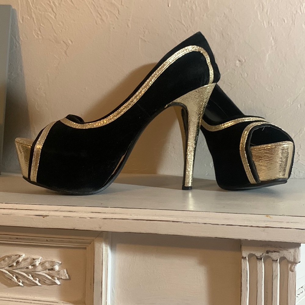 Open toed gold and black heels